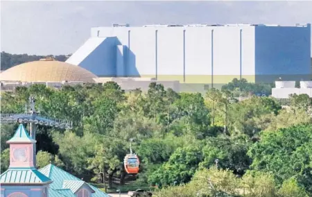  ?? JOE BURBANK/ORLANDO SENTINEL ?? The massive building containing Guardians of the Galaxy: Cosmic Rewind is seen at Epcot, where the roller coaster will debut sometime next year.