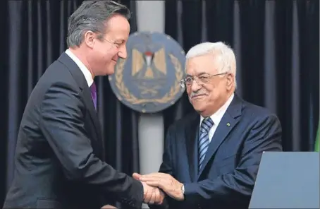  ?? Picture: PA. ?? Prime Minister David Cameron and Palestinia­n President Mahmoud Abbas greeted each other warmly.