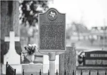  ??  ?? A historical marker tells the extraordin­ary life of Walter Burton next to his gravesite in Richmond’s Morton Cemetery.