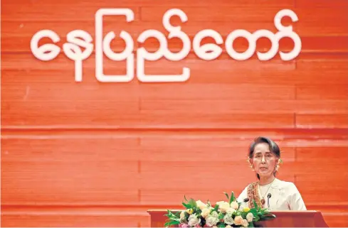  ?? AFP ?? Myanmar’s Foreign Minister and State Counsellor Aung San Suu Kyi speaks during the closing ceremony of the second session of the Union Peace Conference in Naypyidaw on May 29. She defended her stalling push for peace on May 24, saying talks were...