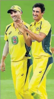  ?? GETTY IMAGES ?? Pat Cummins and Mitchell Starc (right) have played together this season with impressive results.