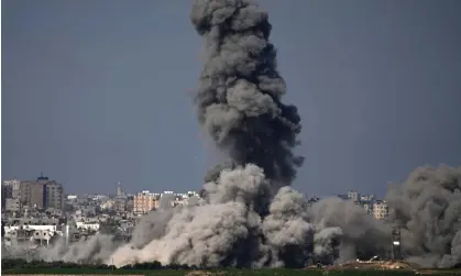  ?? ?? Smoke rises after an Israeli airstrike in the Gaza Strip. Photograph: Francisco Seco/AP