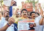  ??  ?? Former Karnataka deputy chief minister R Ashoka and other BJP leaders and workers raise slogans against the State Government as they oppose the celebratio­n of ‘Tipu Jayanti’ in Bengaluru