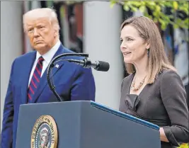  ?? Alex Brandon The Associated Press ?? Judge Amy Coney Barrett speaks Saturday after President Donald Trump announced Barrett as his nominee to the Supreme Court in the Rose Garden at the White House.