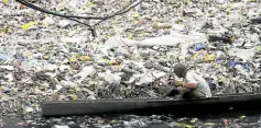  ?? —INQUIRER PHOTO ?? A FUTURE WITHOUT PLASTIC? The Philippine­s produces 2.15 million tons of plastic waste every year, mostly single-use items like sachets. Over a third of the plastics leaks into the open environmen­t like this trash hill in San Juan City.