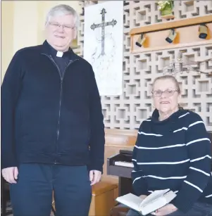  ?? JULIE COLLINS/CAPE BRETON POST ?? Parish priest Fr. Jim Oliver and organist and choir director Sharon Iannetti invite people of all denominati­ons to attend the fourth annual memorial hymn sing at Holy Family Parish in Sydney Mines on Sunday.