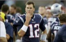  ?? CHARLES KRUPA — THE ASSOCIATED PRESS ?? Patriots QB Tom Brady watches from the sideline last week against the Redskins in Foxborough, Mass.