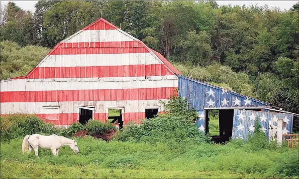  ?? Contribute­d photos ?? Robert Carley, of Darien, took this photo of a barn decorated in the Stars and Stripes in Pennsylvan­ia.