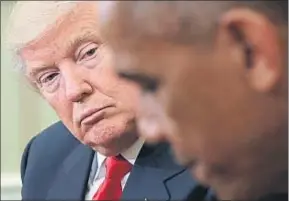  ?? WIN MCNAMEE / AFP ?? Donald Trump, ayer con Barack Obama en la Casa Blanca