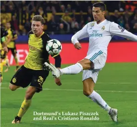  ??  ?? Dortmund’s Lukasz Piszczek and Real’s Cristiano Ronaldo