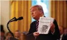  ?? Photograph: Jim Lo Scalzo/EPA ?? Donald Trump has frequently railed against the Washington Post – but he seemed happy to brandish it at the White House in the wake of his impeachmen­t acquittal.
