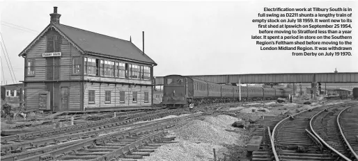  ??  ?? Electrific­ation work at Tilbury South is in full swing as D2211 shunts a lengthy train of empty stock on July 18 1959. It went new to its first shed at Ipswich on September 25 1954, before moving to Stratford less than a year later. It spent a period in store on the Southern Region’s Feltham shed before moving to the London Midland Region. It was withdrawn from Derby on July 19 1970.