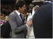  ?? NHAT V. MEYER — BAY AREA NEWS GROUP FILE ?? Golden State Warriors general manager Bob Myers talks to Draymond Green (23) after their 126-125 win over the Sacramento Kings to win Game 4of a Western Conference first-round playoff series at the Chase Center in San Francisco on April 23.