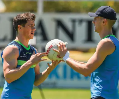  ??  ?? Shane Walsh and Killian Clarke practise a drill during Internatio­nal Rules training at Bendigo Bank Stadium, Mandurah