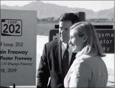  ?? ASSOCIATED PRESS ?? ARIZONA GOV. DOUG DUCEY TALKS with Phoenix Mayor Kate Gallego during the christenin­g of the new South Mountain Freeway in Phoenix on Wednesday.