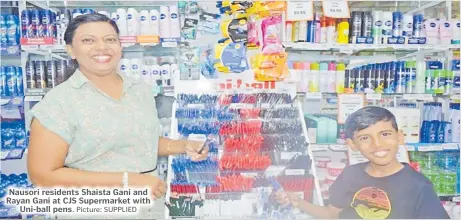  ?? Picture: SUPPLIED ?? Nausori residents Shaista Gani and Rayan Gani at CJS Supermarke­t with Uni-ball pens.
