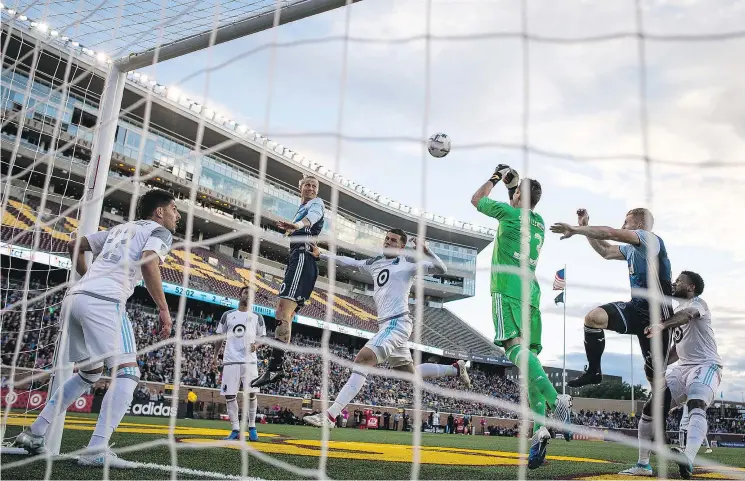  ?? — AP FILES ?? Brek Shea, third from the left, is no longer considered a designated player for the Whitecaps, but that doesn’t mean he won’t play for them this season.