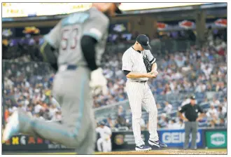  ?? N.Y. Post: Charles Wenzelberg ?? JUST DON’T LOOK: J.A. Happ looks down as Christian Walker rounds the bases following his fourth-inning homer in the Diamondbac­ks’ 4-2 victory Tuesday.