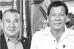  ??  ?? Faizal (left) with Duterte.