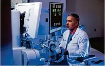  ?? Virtual Incision ?? Dr. Ted Voloyianni­s of Texas Oncology in Houston participat­es in a Feb. 10 surgical simulation on the Internatio­nal Space Station.