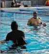  ?? KARINA BRADY / U.S. AIR FORCE ?? Carl Scott, Wright-Patterson Air Force Base Dodge Fitness Center instructor, teaches a weekly aqua cycling class in the Dodge Fitness Center.