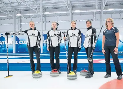  ?? Picture: Perthshire Picture Agency. ?? Team Muirhead, from left, Vicky Wright, Jennifer Dodds, Lauren Gray and Eve Muirhead with coach Nancy Smith.