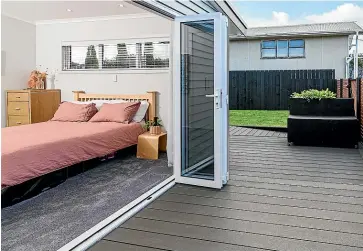  ?? RAY WHITE ?? Even the bi-fold doors of this Blockhouse Bay property are energy efficient.