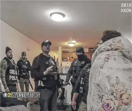  ?? CBS2 CHICAGO ?? Police body camera video shows the Feb. 21, 2019, raid on the home of Anjanette Young.