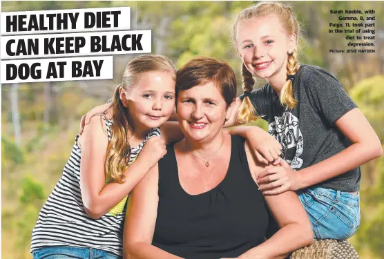  ?? Picture: JOSIE HAYDEN ?? Sarah Keeble, with Gemma, 8, and Paige, 11, took part in the trial of using diet to treat depression.