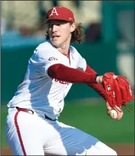  ?? (NWA Democrat-Gazette/Andy Shupe) ?? Arkansas starter Hagen Smith delivers a pitch Friday during the third inning of the Razorbacks’ 5-1 win over Murray State at Baum-Walker Stadium in Fayettevil­le. Scouts were on hand to watch Smith, who in the preseason came in at 16th in Baseball America’s MLB Draft prospect rankings.