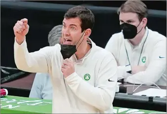  ?? ELISE AMENDOLA/AP PHOTO ?? Boston Celtics head coach Brad Stevens instructs his players in the second half of a game against the Sacramento Kings on March 19 in Boston.