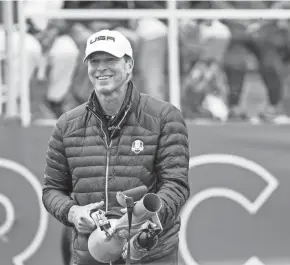  ?? ?? Team USA captain Steve Stricker holds a T-shirt cannon during practice at the 43rd Ryder Cup at Whistling Straits.