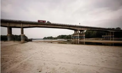  ?? Photograph: Guglielmo Mangiapane/Reuters ?? The dry riverbed of the Po, which is the Italian peninsula’s largest water reservoir.