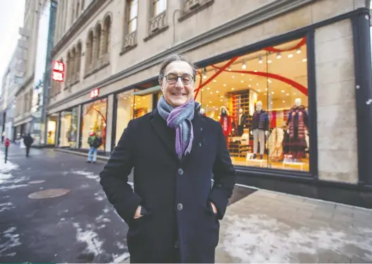  ?? JOHN MAHONEY ?? “Malls have to move away from a real estate asset mindset and move toward creating engagement centres,” says Charles de Brabant, executive director of Mcgill University's Bensadoun School of Retail Management. Behind him: the Eaton Centre's Uniqlo store.