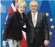  ?? FOTO: DPA ?? EU-Kommission­schef Jean-Claude Juncker und die britische Premiermin­isterin Theresa May waren sich am Montag nicht einig.