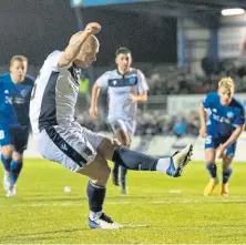  ?? ?? Charlie Adam scores from the spot for Dundee.