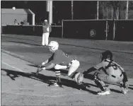  ?? MARK HUMPHREY ENTERPRISE-LEADER ?? Farmington sophomore Drew Sturgeon fouls off an attempted bunt. After falling behind in the count 1-2 with the bases loaded, Sturgeon blasted a 3-run triple. The Cardinals beat Rogers Heritage 13-3 on Monday, March 5, at home.