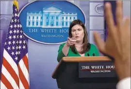  ?? Chip Somodevill­a Getty Images ?? SARAH HUCKABEE SANDERS wrongly said President Trump had created three times more jobs for black people than President Obama did in eight years.