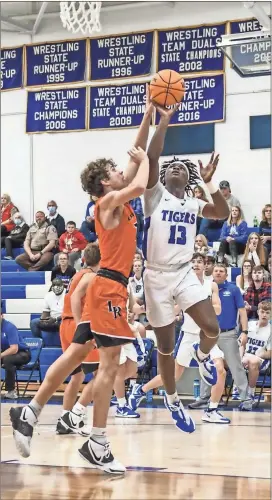  ?? Courtney Couey, Ringgold Tiger Shots ?? Lafayette’s Aidan Hadaway defends a drive by Ringgold’s Jordan Wideman. The Ramblers won three Region 6- AAA games last week, two on the road, by an average of 23 points, including one win over a state-ranked opponent.