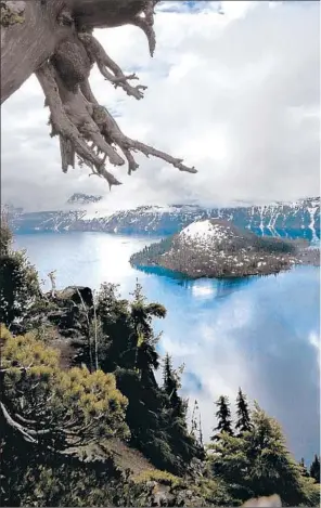  ??  ?? A MOUNTAIN blew its top 7,700 years ago; the void became Crater Lake. Wizard Island i