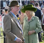 ??  ?? LEFT TO RIGHT: The Duchess chats to ex-husband Andrew Parker Bowles at Cheltenham races. While in New Zealand in 2015, Camilla met mothers and babies at an introducti­on to the Bellyfull charity. The royal couple wearing korowai at Turangawae­wae Marae.