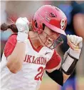  ?? [PHOTO BY
SARAH PHIPPS, THE
OKLAHOMAN] ?? OU sophomore Caleigh Clifton hit a two-run homer in the bottom of the 10th inning in Sunday’s game to help the Sooners past Tulsa. It was also the third anniversar­y of her Dad’s
death.