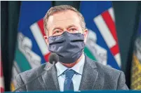  ?? JEFF MCINTOSH THE CANADIAN PRESS ?? Alberta Premier Jason Kenney’s decision to call a state of emergency and “reluctantl­y” adopt a vaccine passport has the potential to change the course of the election, Althia Raj writes.