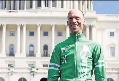  ?? Contribute­d photo ?? Monte Frank stands outside the U.S. Capitol in Washington, D.C., after a bicycle trip from Newtown to Washington to advocate for meaningful gun violence prevention legislatio­n.