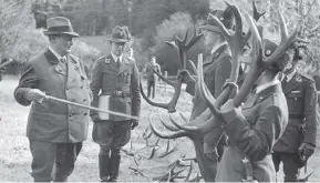  ?? BUNDESARCH­IV / WIKIMEDIA COMMONS ?? Hermann Goering inspecting antlers following a hunting trip. It was Goering’s interest in hunting and forestry that would prompt him to patronize a scheme to restore a depopulate­d Europe to its prehistori­c state.