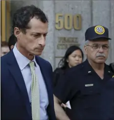  ??  ?? Former Congressma­n Anthony Weiner leaves federal court following his sentencing, Monday, in New York. Weiner was sentenced to 21 months in a sexting case that rocked the presidenti­al race. AP PHOTO/ MARK LENNIHAN