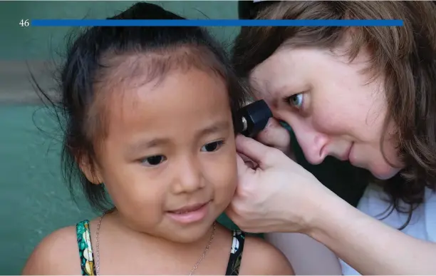  ?? World wide Hearing photo ?? World Wide Hearing Executive Director Audra Renyi conducts a hearing test on a little girl in Guatemala. WWH has screened more than 45,000 people and provided over 3,000 hearing aids worldwide.