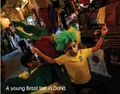  ?? A young Brazil fan in Doha ??