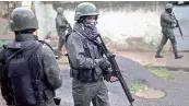  ?? AP ?? Soldiers patrol a street during a surprise operation at the Vila Alianca slum in Rio de Janeiro, Brazil, on Friday.