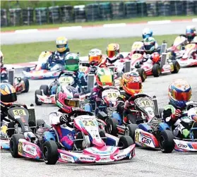  ?? CONTRIBUTE­D FOTO ?? POLE POSITION. Cebuano karter William John Riley Tiu Go takes the pole position in the pre-final in the X30 race in Malaysia.